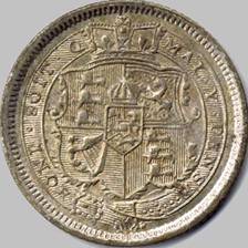 A close-up of a coin

Description automatically generated